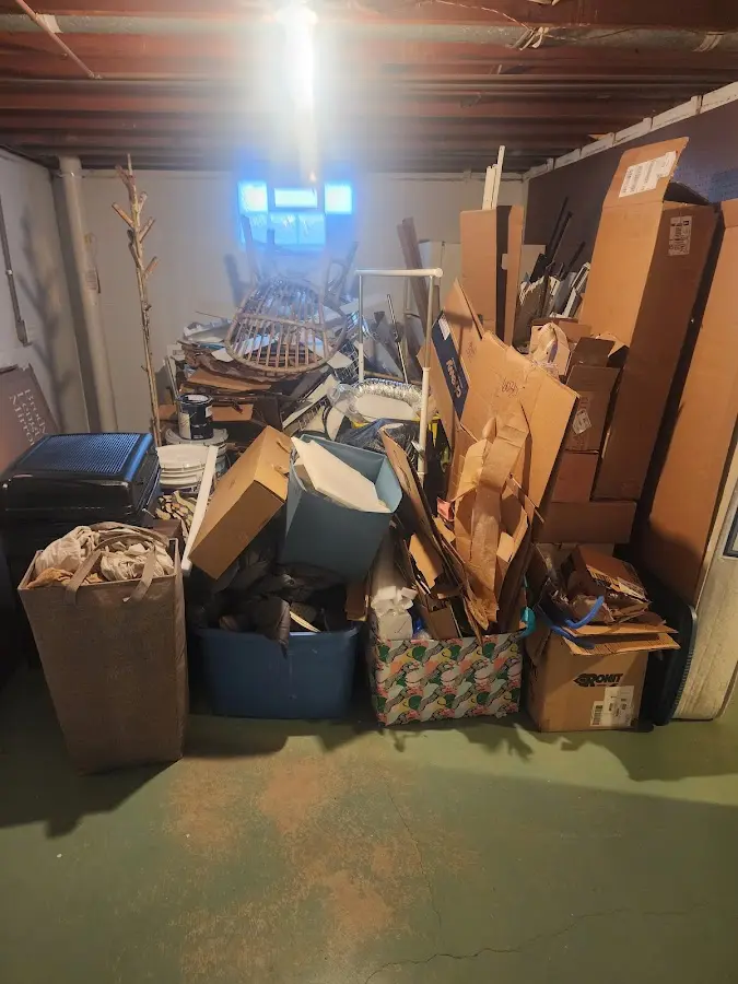 Roll-off dumpster container at job site for Yard Waste Dumpster Rental in Lake of the Woods